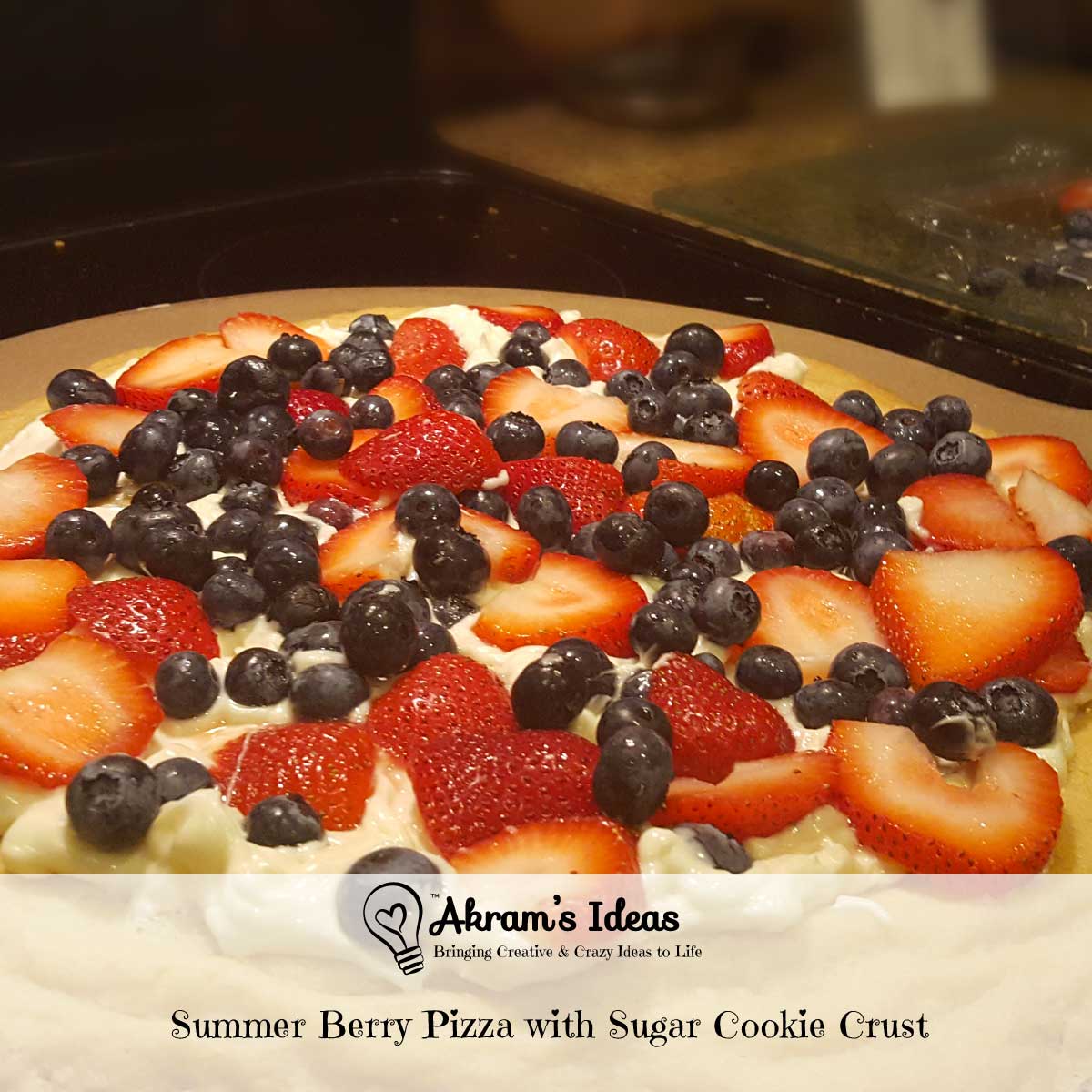 Recipe for an end of summer berry pizza with sugar cookie crust and white chocolate sauce.