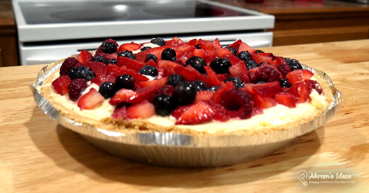 Quickie bake recipe for Lemon Berry Pie a no-bake lemon cheesecake topped with seasonal berries. The perfect dessert for a summer get-together.