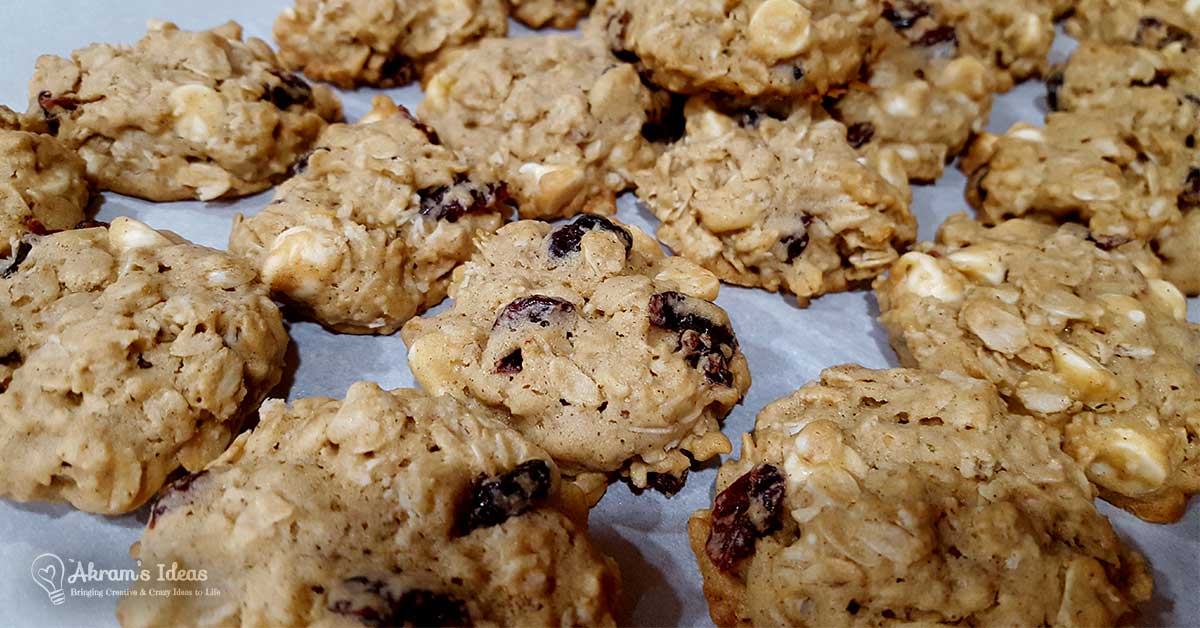 Recipe for Cranberry White Chocolate Oatmeal Cookies, a holiday twist on a soft chewy oatmeal cookie by adding dried cranberries and white chocolate chips.